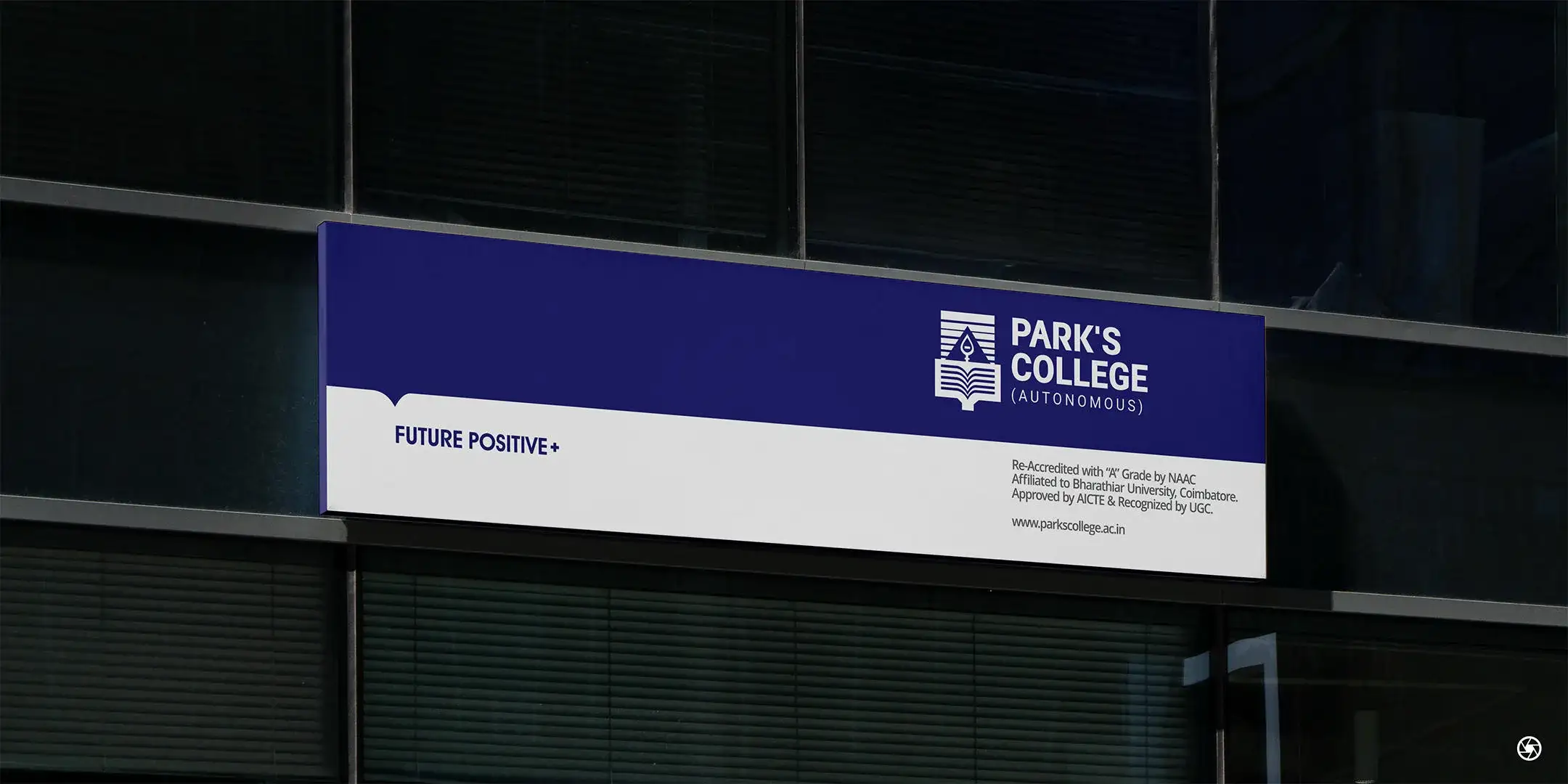 Park's College entrance sign board in institutional purple