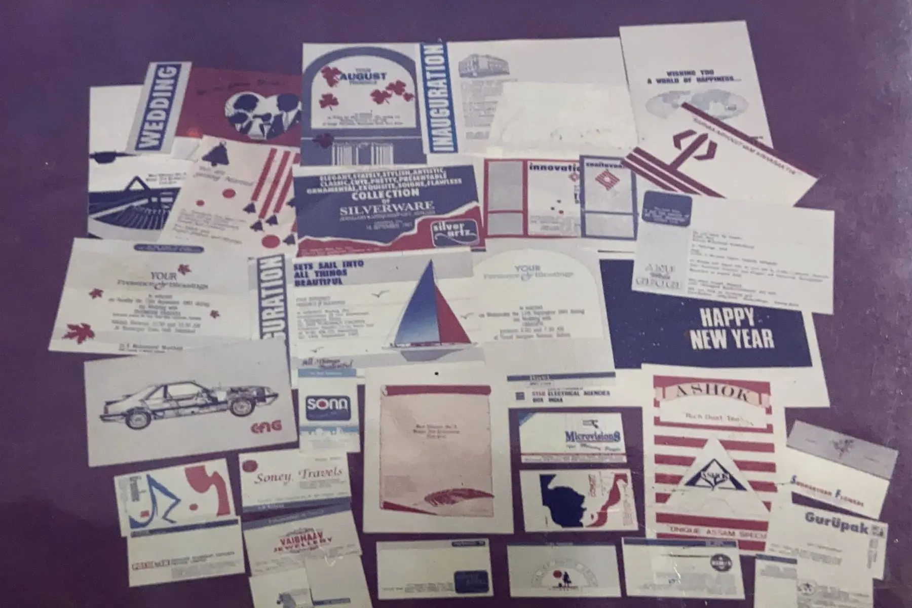 A spread of Exposure's early print work - wedding cards, inaugurations, and corporate collateral