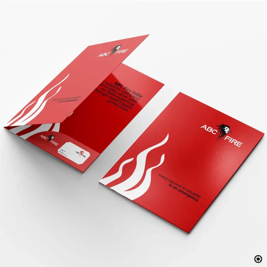 ABC Fire - presentation folder shown open and closed, 'every second is valuable in an emergency' set inside, business card tucked into the inside pocket