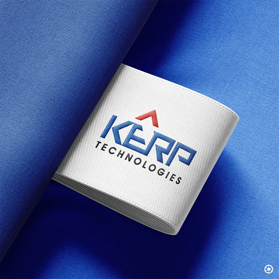 KERP Technologies primary logo, navy wordmark with the red peak, on a folded fabric surface