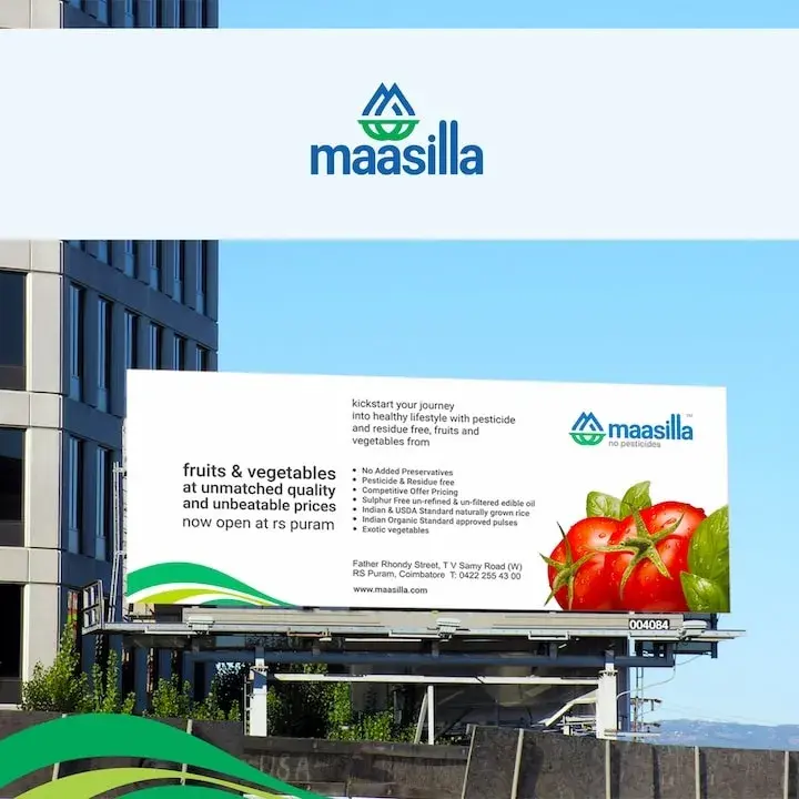 Maasilla outdoor hoarding - fruits and vegetables at unmatched quality, now open at RS Puram, with brand mark and fresh produce photography