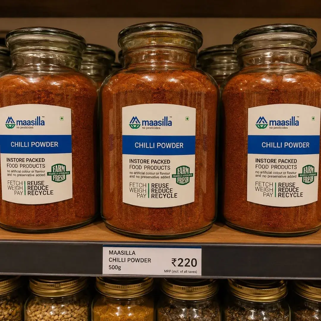 Maasilla in-store shelf - branded Chilli Powder glass jars with Maasilla labels and Rs.220 price card