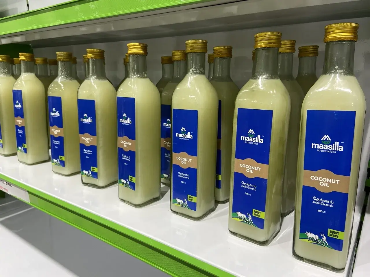 Maasilla coconut oil - 500ml glass bottle on retail shelf