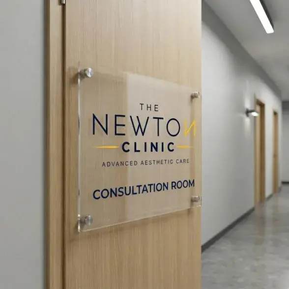The Newton Clinic acrylic consultation-room door sign