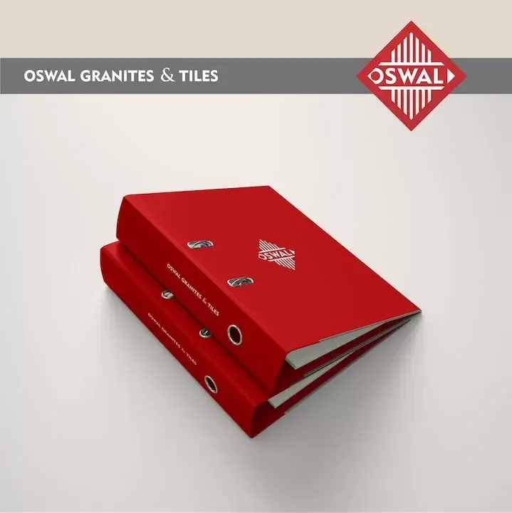 Oswal Granites & Tiles - two stacked red lever arch files with Oswal diamond mark on spine and cover