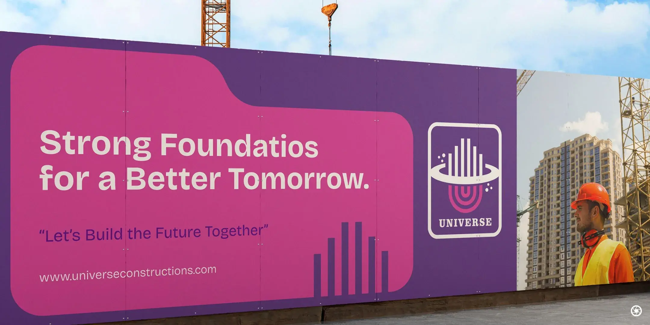 Universe Constructions - 'Strong Foundations for a Better Tomorrow.' kerb-side ad board in magenta and purple, with a worker in hi-vis to the right