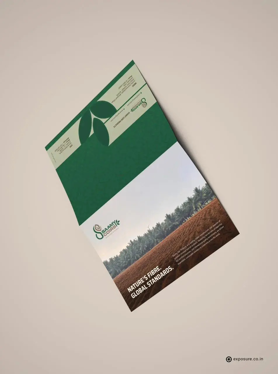 Saamy Coirs export brochure — folded portrait mockup on light surface